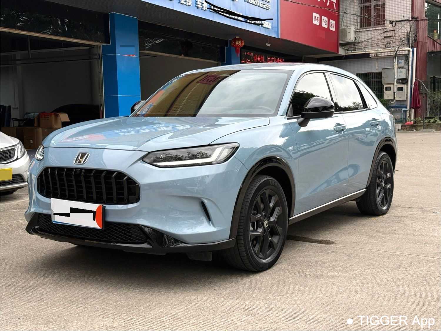 Подержанный HONDA ZR-V 2023 2.0L e: HEV Rui · Premium Edition